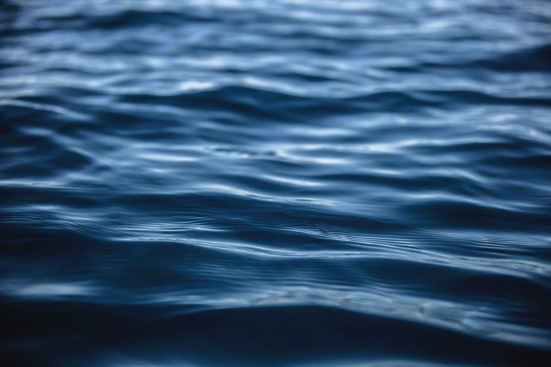 Deep blue water with gentle waves